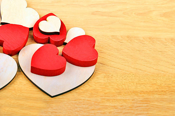 istock Heart on wooden background 539230228