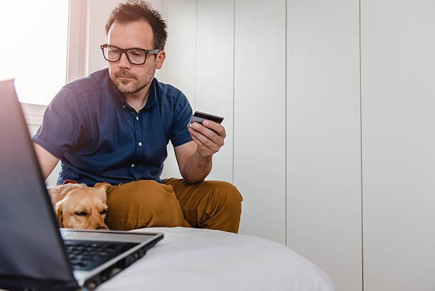 istock Man paying online with credit card 539230614