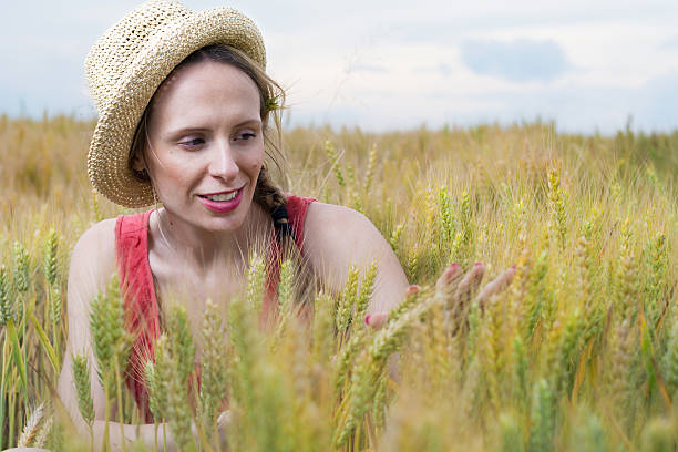 istock Beautiful Woman in Wheat Field 539232054