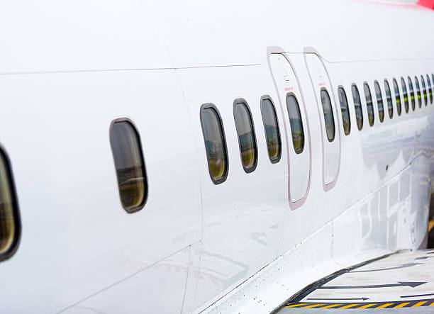 istock Row of the Windows in the plane 539232678