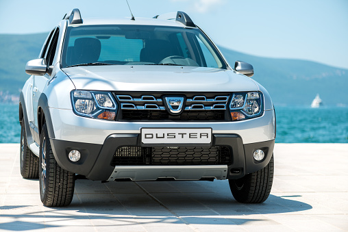 Tivat, Montenegro - May 27, 2016: Dacia Duster on Tivat's pier at display. Name, brand logo and all design features of vehicle visible. Editorial use only.