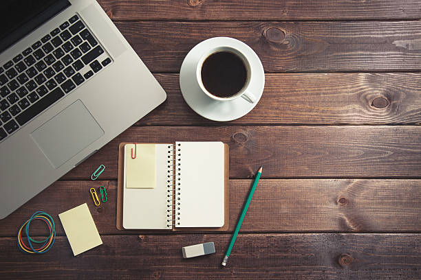 istock Office supplies on the wooden table 539232965
