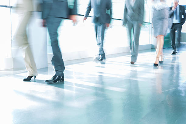 istock Group of business people walking on corridor 539233521