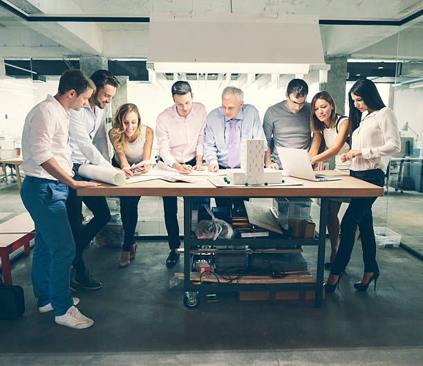 istock Architects reviewing architectural model in the office. 539233557