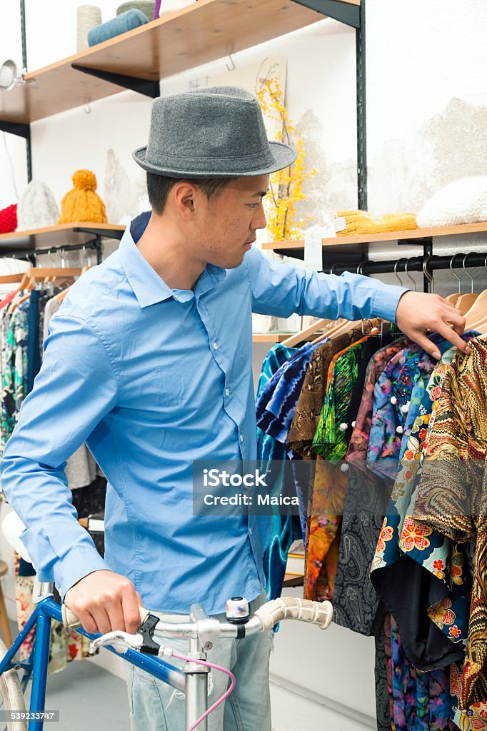 Young Asian buying 2015 Stock Photo