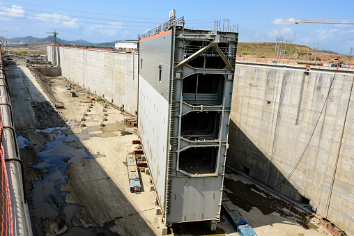 A new gate of the Panama Canal expansion project waiting to be installed.  This is one of the worlds largest construction projects which will expand the Panama Canal to accomodate the new Panamax type ships by adding a third set of locks. The gate itself is over nine stories high.