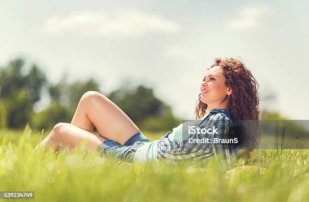 Woman Enjoying A Day In Grass Stock Photo - Download Image Now - 2015, Adult, Adults Only