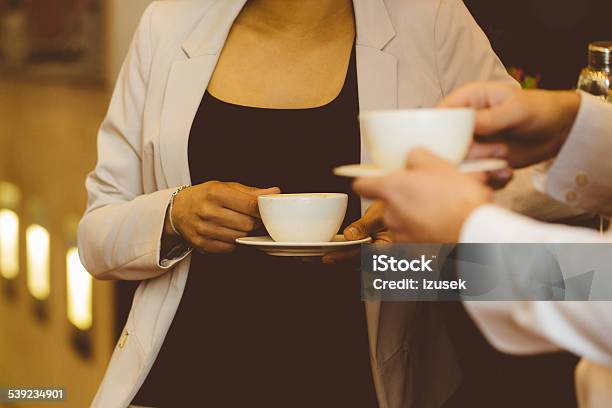 Two Business People Having Coffee Break Stock Photo - Download Image Now - 2015, Adult, Adults Only