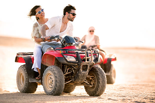 istock Couple having fun on quad bike. 539235767