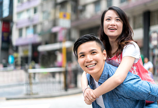 istock Asian couple having fun outdoors 539237050