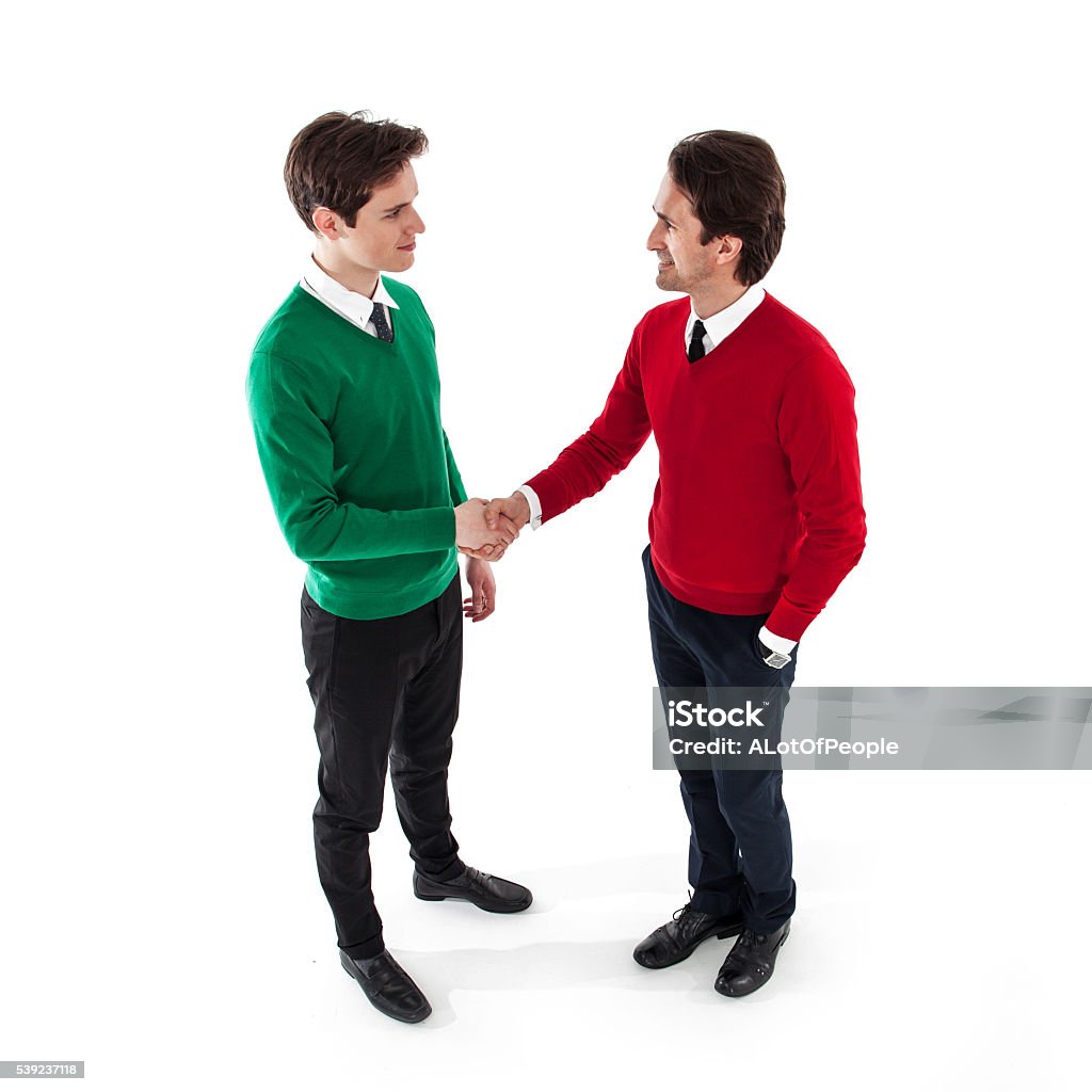 People shaking hands Two men shaking hands isolated on white background Adult Stock Photo