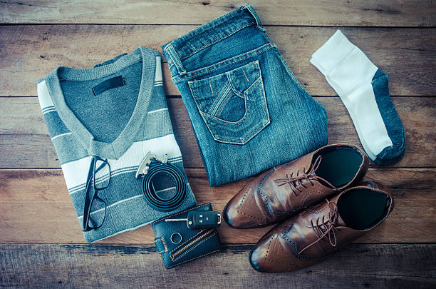 istock Sweaters, jeans, socks, shoes, belts, wallets, sunglasses, ready for travel. 539239094