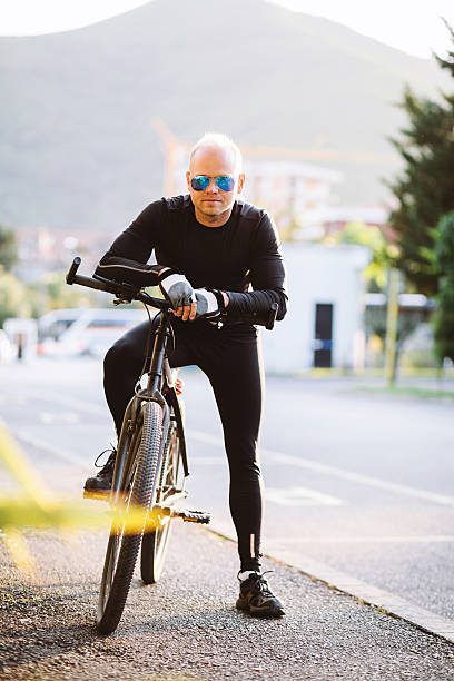 istock bicycle style man portrait 539239360
