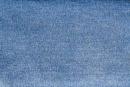 Blue denim jeans texture for background. Vintage style