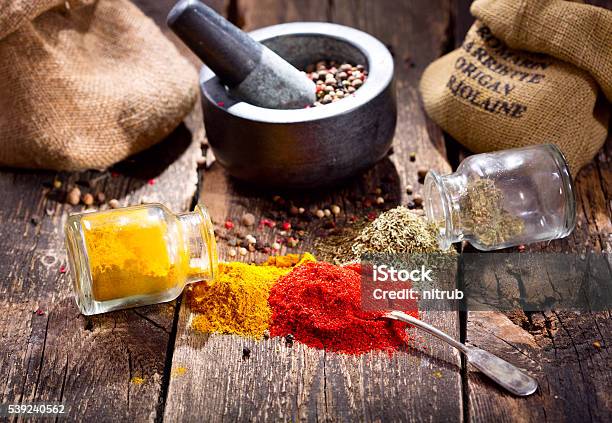 Various Spices On Wooden Table Stock Photo - Download Image Now - Close-up, Cooking, Dry