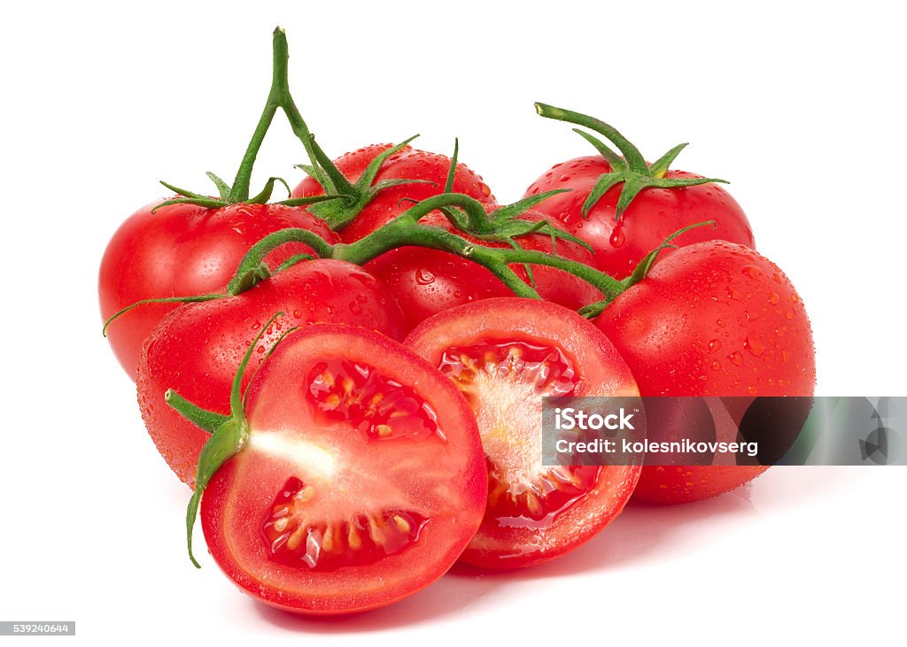 tomatoes branch and half with water droplets isolated white background tomatoes branch and half with water droplets isolated on white background Agriculture Stock Photo