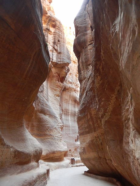 istock ROCK PASSAGE IN PETRA, JORDAN 539241058