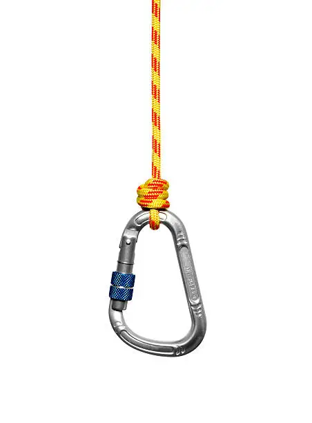 Carabiner with clipping path hanging strapped on prusik. Isolated on white.