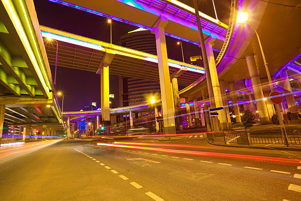 istock Empty road floor with city elevated bridge of night 539244398