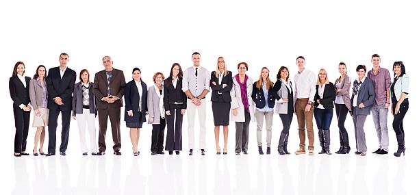 istock Large group of smiling business people in a line. 539244485