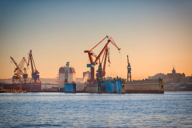 Gothenburg harbor. Dry dock and cranes Entrance to Gothenburg. Island of Hisingen to the left. västra götaland county stock pictures, royalty-free photos & images