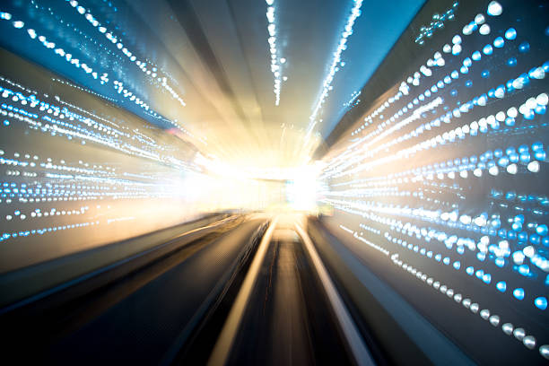 istock futuristic super speed traffic  blur motion in tunnel 539244801