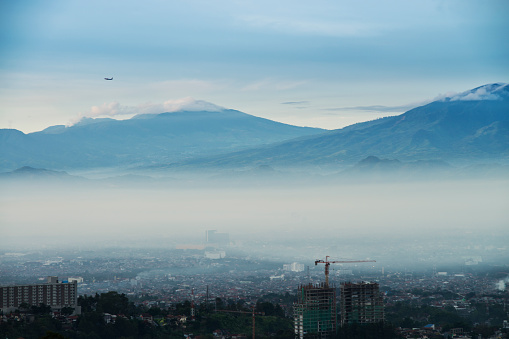 Bandung, the capital city of West Java Province in Indonesia is under the haze in the morning.