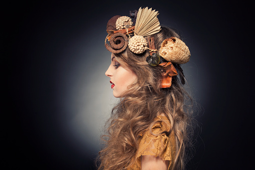 https://media.istockphoto.com/id/539245481/photo/beautiful-woman-with-autumn-wreath-in-hair.jpg?b=1&s=170667a&w=0&k=20&c=dNmuM_OJbKvEbKyQX1Y6rqtjqXCVx014HyWztlx8-_Y=