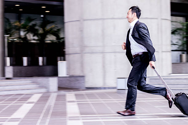 istock Business executive running to catch his next meeting. 539245558