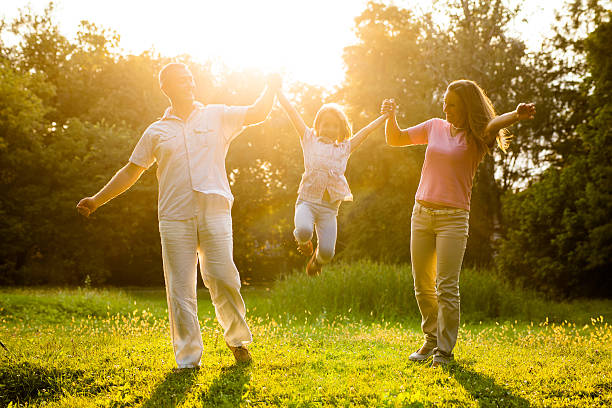 istock Happy family in park 539246021