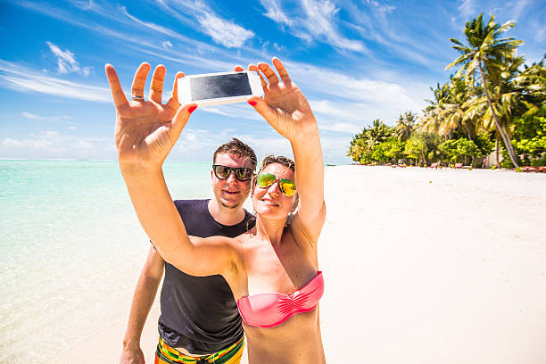 istock Couple selfie in the tropical paradise 539246703
