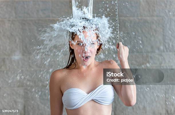 Teenage Girl Taking Shower After Sauna In Health Spa Stock Photo - Download Image Now