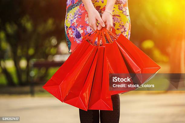 Carrying Shoppings Bags Stock Photo - Download Image Now - 2015, Adult, Adults Only