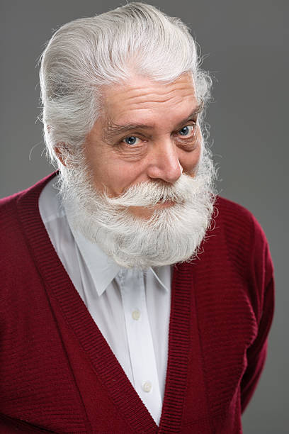 istock Portrait of smiling senior man 539257473