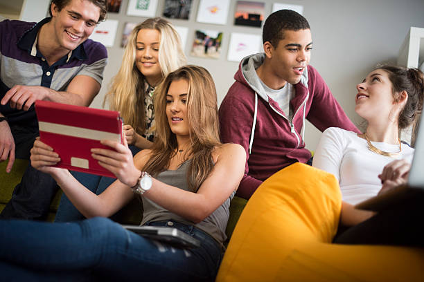 istock young people relaxing online 539258435