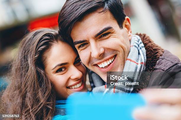 Happy Friends Making Selfie Outdoors Stock Photo - Download Image Now - 20-29 Years, 2015, Adult