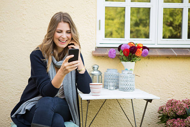 istock Woman outdoors in front of her house. 539259185