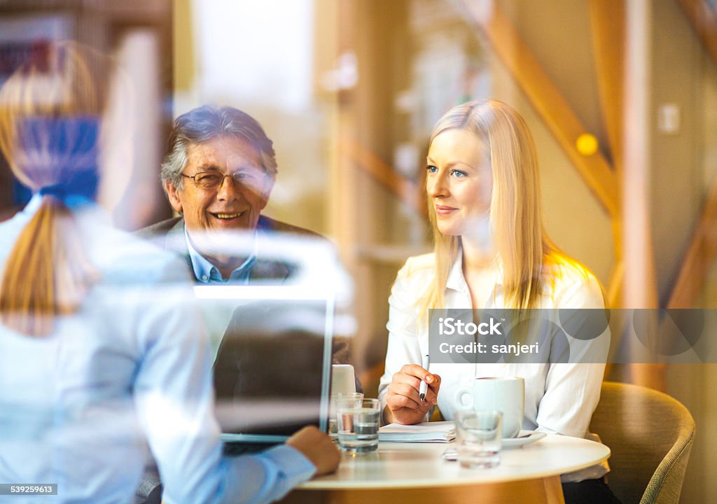 Business meeting at the coffee bar Active Seniors Stock Photo