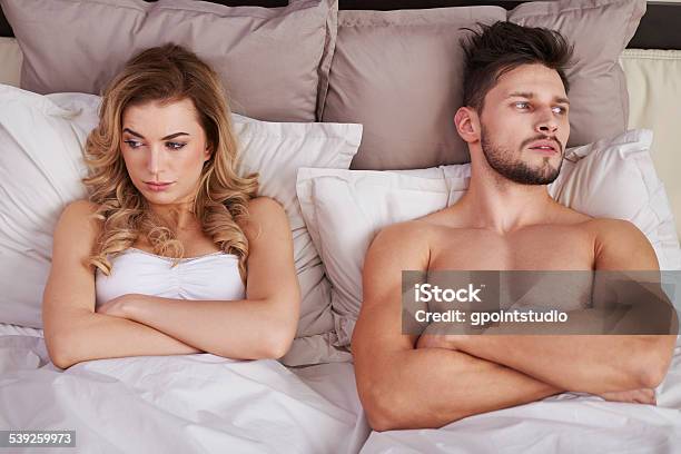 Big Trouble In Young Marriage Stock Photo - Download Image Now - Arguing, Bed - Furniture, Couple - Relationship
