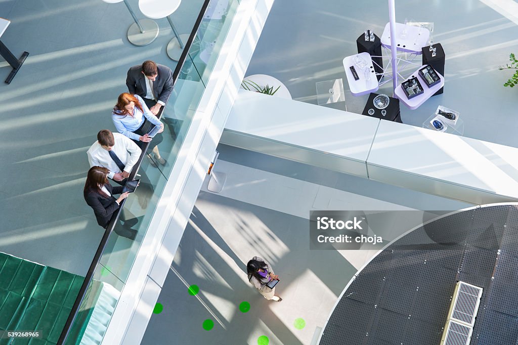 Business people in an entrance hall of office building 2015 Stock Photo