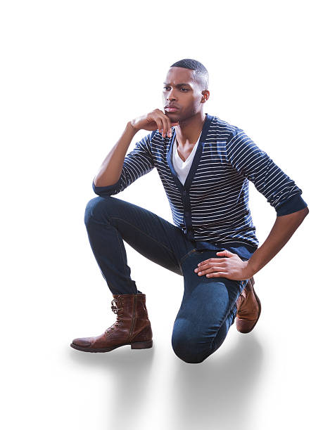istock Young African American Man kneeling on floor 539269429