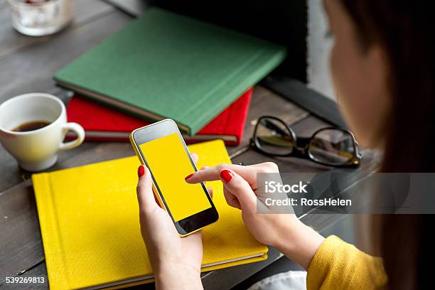 Using Smart Phone Stock Photo - Download Image Now - Adult, Advice, Book