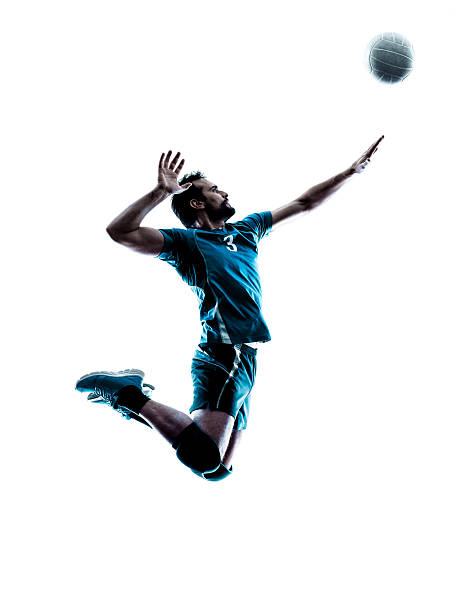 man volleyball jumping silhouette one caucasian man volleyball jumping in studio silhouette isolated on white background in studio silhouette isolated on white background male volleyball player stock pictures, royalty-free photos & images