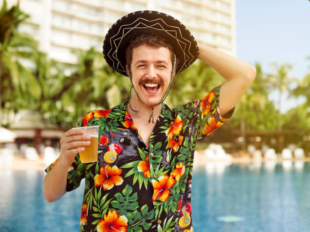 Tourist drinking beer Tourist at a beach resort cancun photos stock pictures, royalty-free photos & images
