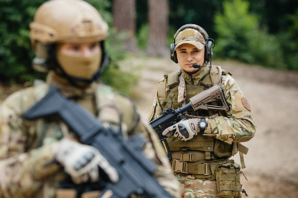 istock Two soldiers scout the area occupied by the enemy 539270619