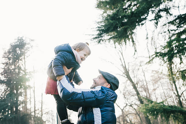 istock Father Swinging His Daughter 539271013