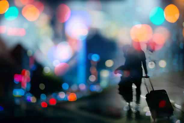 passengers in city background at night, double exposure.