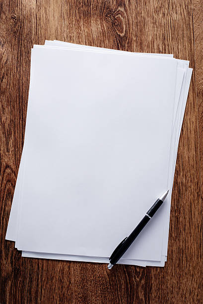 istock Clean Bond Papers and Pen on Top of Table 539272005