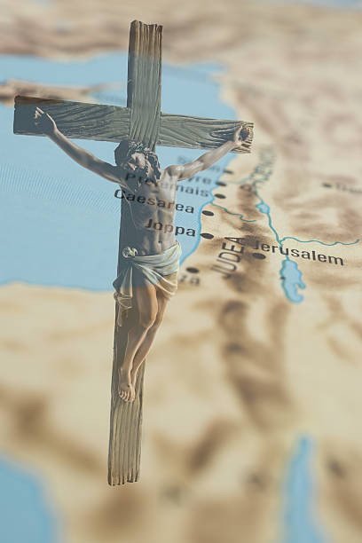 istock Crucifix over an image of a biblical map. 539272023