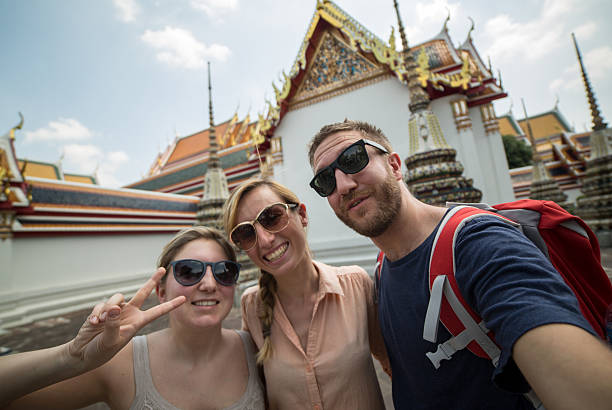 istock Cheerful tourist in Asia taking selfie 539272371